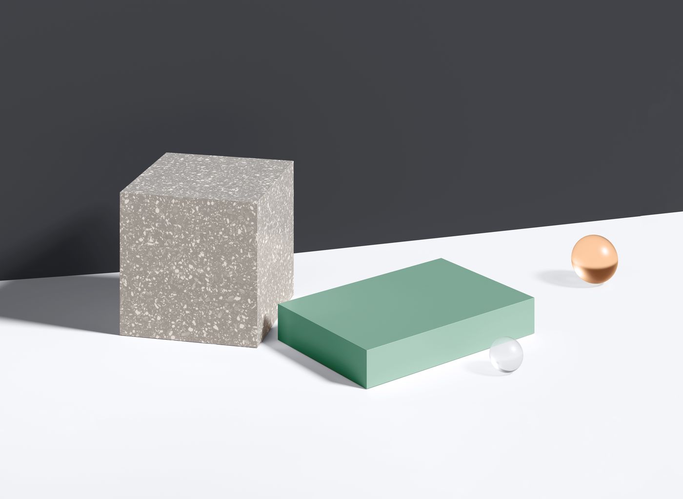 Abstract rendering of a textured upright block, green rectangular slab, and two spheres on a white surface.
